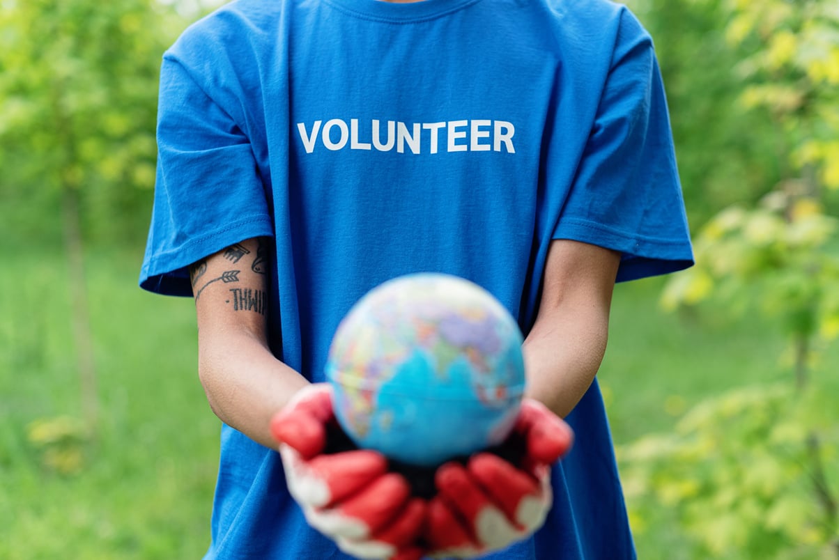 Close-Up Shot of Person Holding a Globe